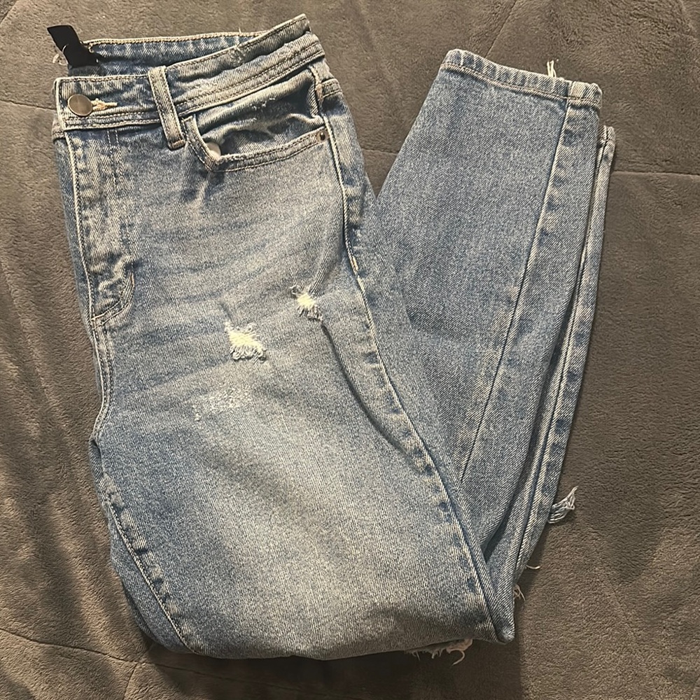 Women's Light Blue Distressed Jeans